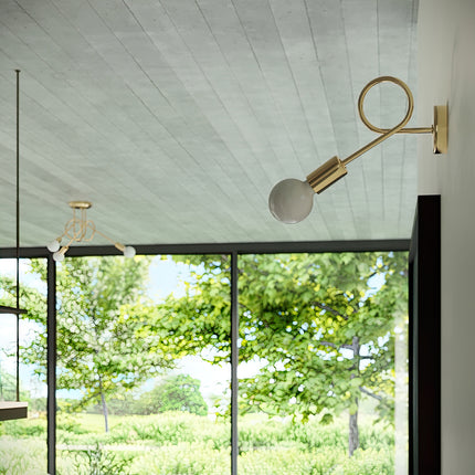 Moderne Wandleuchte Loop in glänzendem Gold