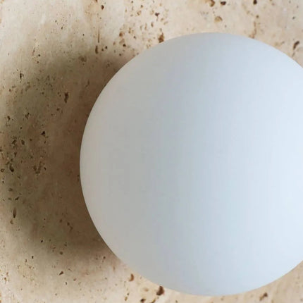 Aplique de pared circular de travertino natural