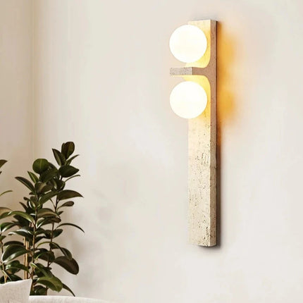 Lámpara de pared de piedra con tira vertical LED