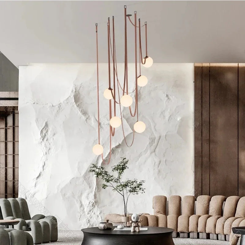 Suspension en cuir créatif avec hauteur ajustable, équipée d'ampoules LED pour un éclairage économe en énergie.