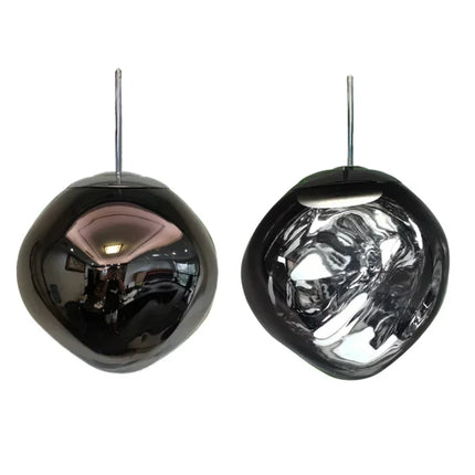 Suspension moderne en forme de bulle avec finition gris fumé, idéale pour un intérieur élégant et créatif.