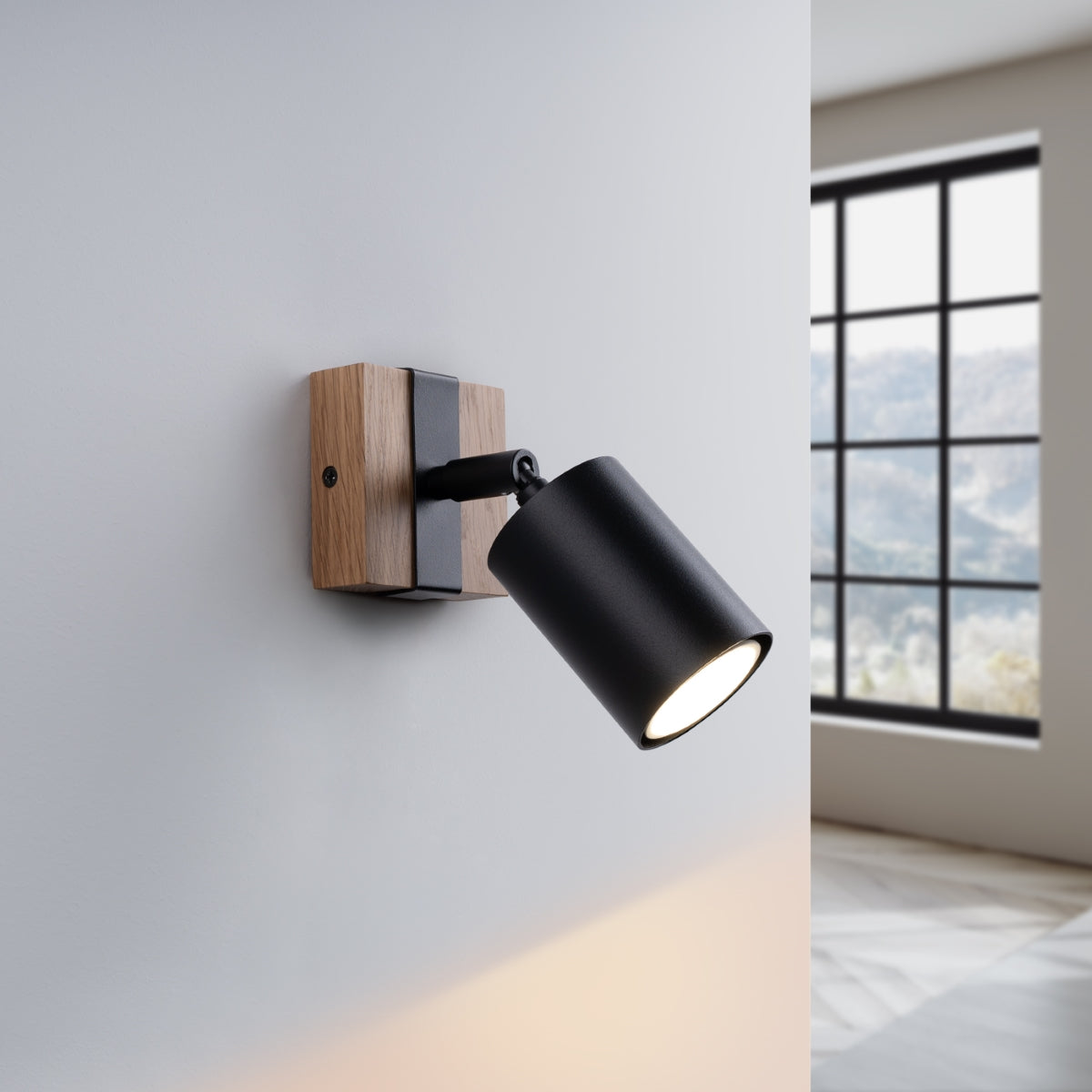 Adjustable black wooden base wall light