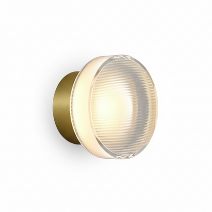 Round wall light in grooved acrylic, gold finish