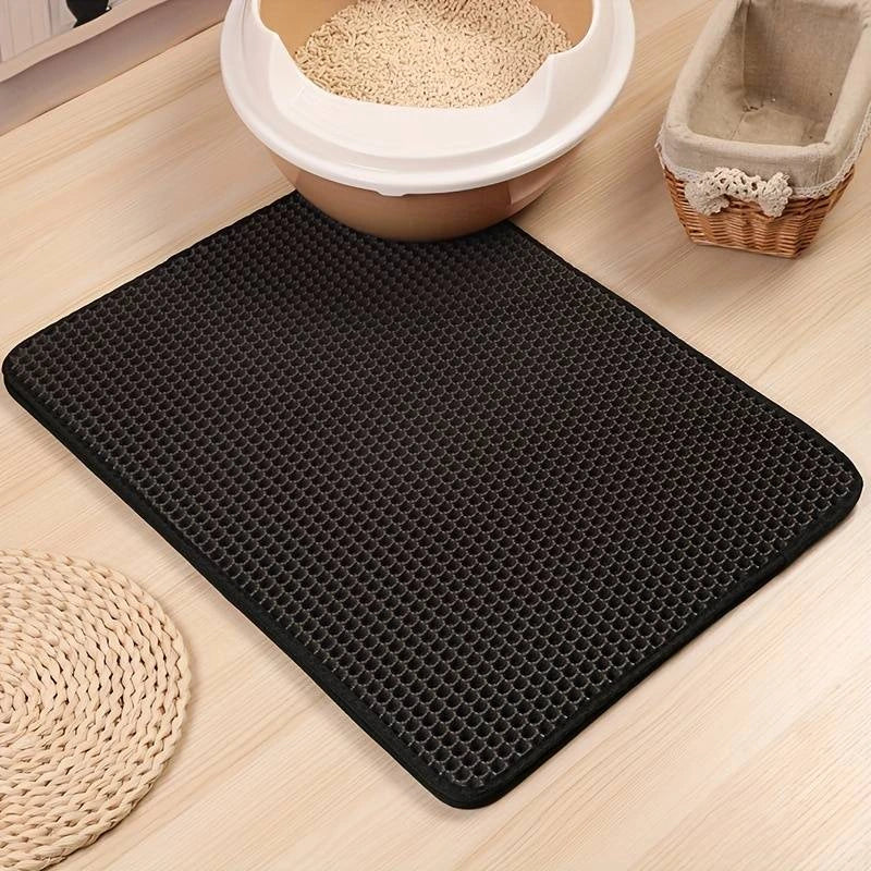 Tapis de litière innovant pour chat avec design double couche pour une capture efficace des grains.