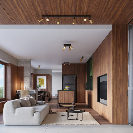 Applique Acier Luxe Noir/Doré installée dans un intérieur moderne