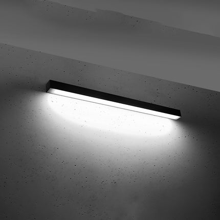 Applique barre moderne LED noire 90 cm allumée, diffuseur opale lumineux homogène