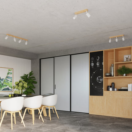 Salle de vie avec applique et plafonniers assortis en bois et métal blanc