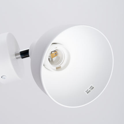 Détail de la cloche orientable en acier blanc de l'applique Elba