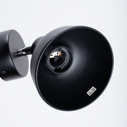 Détail de la cloche orientable en acier noir de l'applique Elba