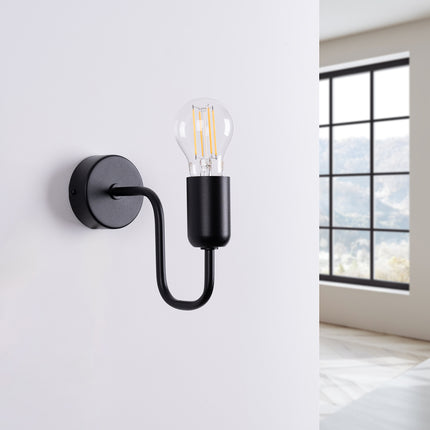 Applique murale noire Design Flex avec ampoule à filament sur mur blanc