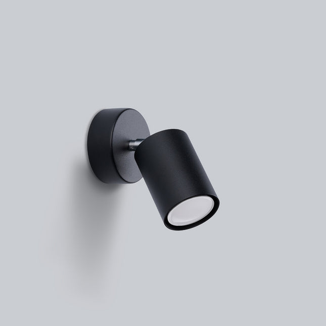 Applique Focus Moderne noir vu de profil, articulation chromée et tête cylindrique en acier.