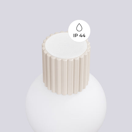 Pictogramme IP44 signalant la protection contre les projections d'eau de l'applique Halo beige