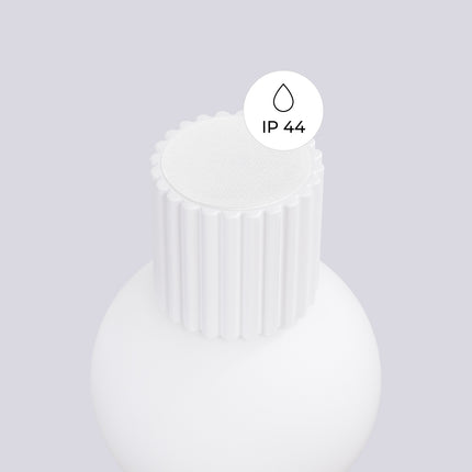 Pictogramme IP44 signalant la protection contre les projections d'eau de l'applique Halo blanche