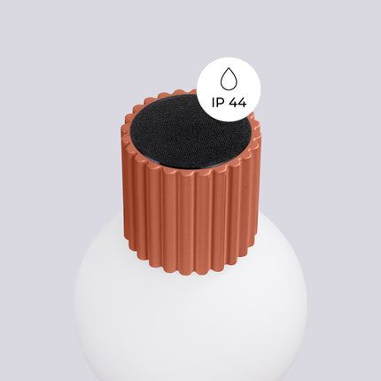 Pictogramme IP44 signalant la protection contre les projections d'eau de l'applique Halo rouge ocre