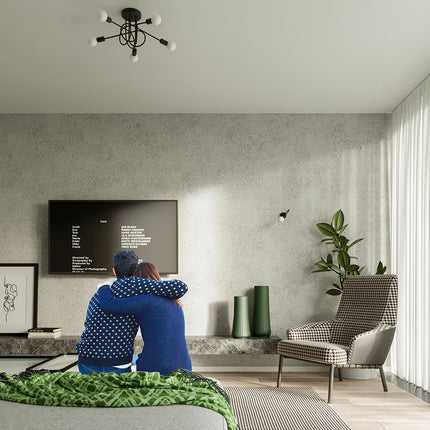Applique Loop Moderne Noire, allumée, gros plan sur la lumière diffusée