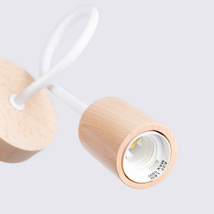 applique murale à bras bouclé en bois et métal blanc, packshot de trois quarts