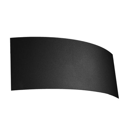 Applique murale Arc en acier noir mat, forme galbée, éclairage indirect, sur mur clair