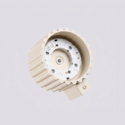 Applique murale Aura beige, vue sur fond coloré