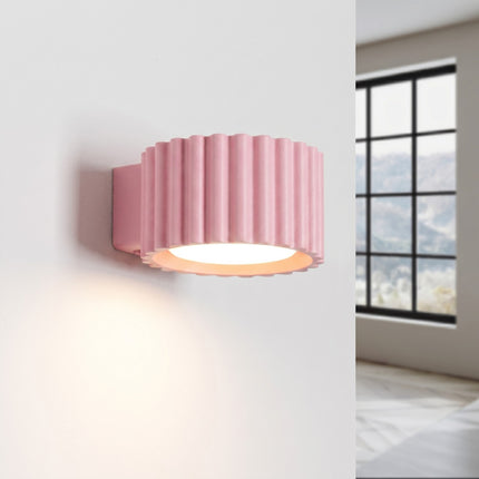 Applique murale Aura rose poudré, lumière allumée