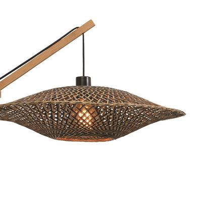 Vue de profil sur fond blanc de l'applique murale Bali en bambou tressé naturel et noir allumée