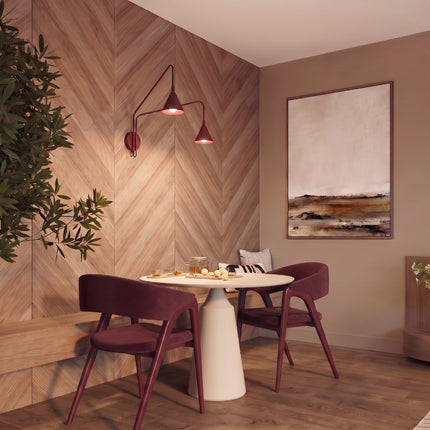 Applique murale Bergen double cône à bras opposés bordeaux au-dessus d'une table