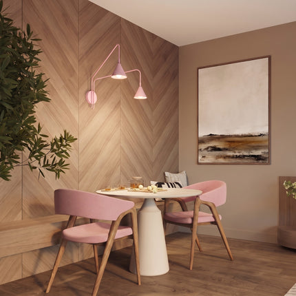 Applique murale Bergen double cône à bras opposés rose poudré au-dessus d'une table