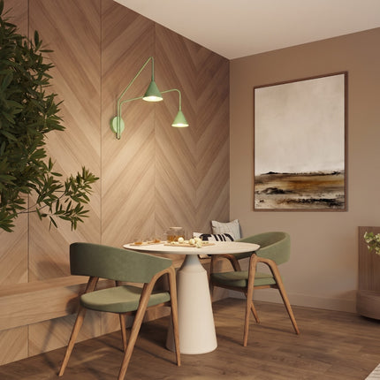 Applique murale Bergen double cône à bras opposés vert sauge au-dessus d'une table