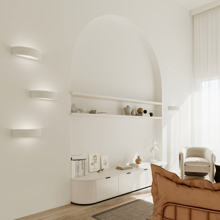 Applique murale en céramique demi-cercle LED près d'une tête de lit