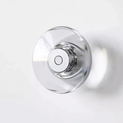 Applique murale en cristal massif, disque circulaire transparent avec moyeu chromé sur fond clair