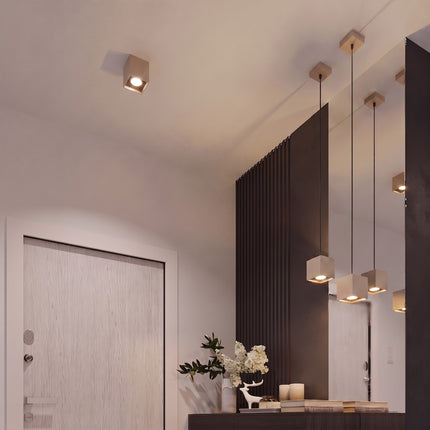 Applique Murale Cube LED taupe dans une entrée contemporaine