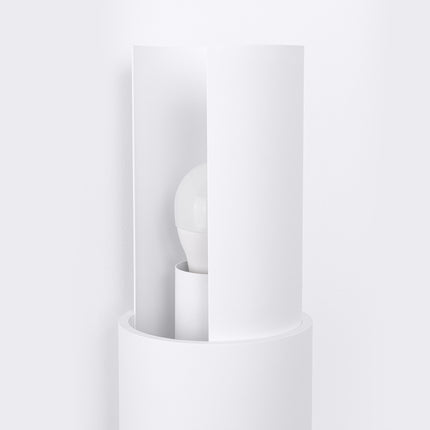 applique murale double cylindre éclairage haut et bas blanc, vue sur fond coloré