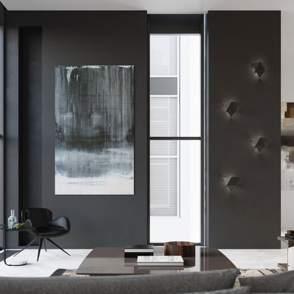 Applique murale géométrique triangle noire dans une ambiance déco chaleureuse