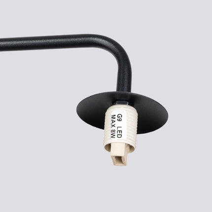 applique murale globe opale à bras coudé noir, packshot de trois quarts