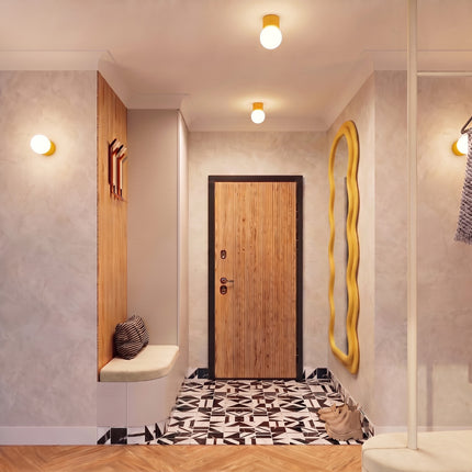Applique murale Halo jaune ambré IP44 au-dessus d'un îlot de cuisine