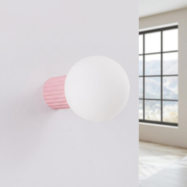Applique murale Halo rose poudré IP44, vue en situation sur fond clair