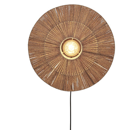 Lit Iguazu natural woven jute wall light, black fabric cable with switch, product shot