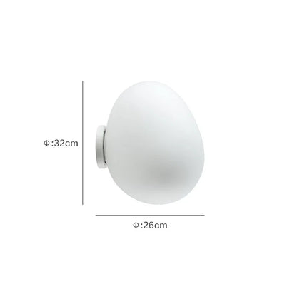 Applique murale LED sphérique diamètre 32 cm dans un intérieur moderne