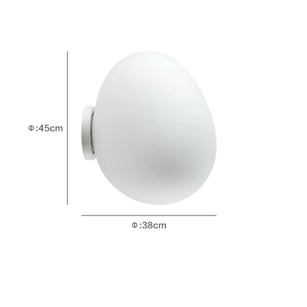 Applique murale LED sphérique diamètre 45 cm sur un mur clair