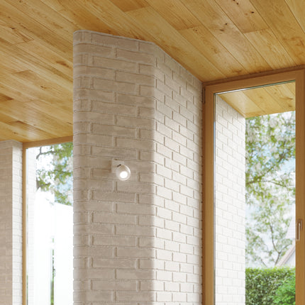 Applique murale oculaire spot orientable blanche vue de profil sur son volume