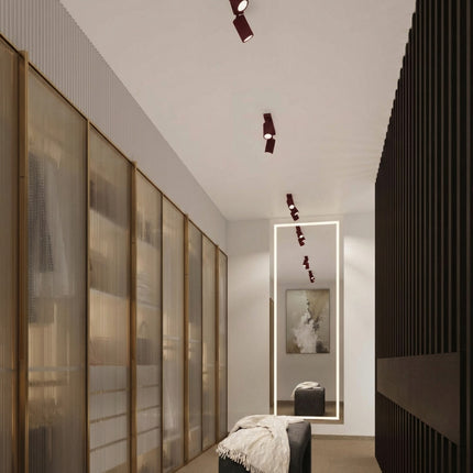 Applique murale orientable Oslo bordeaux dans un intérieur contemporain