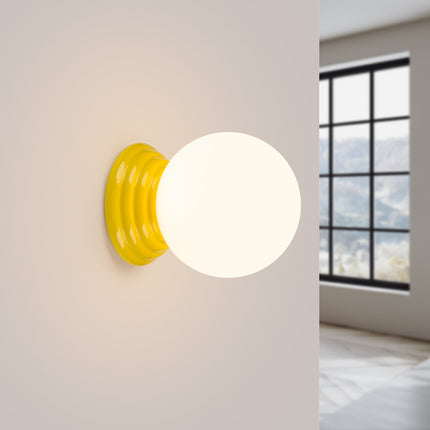 applique murale perle céramique jaune ambré ip44, lumière allumée
