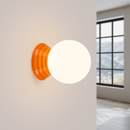 applique murale perle céramique orange ip44, lumière allumée