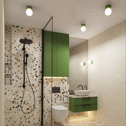 applique murale perle céramique vert olive ip44, dans une pièce à vivre