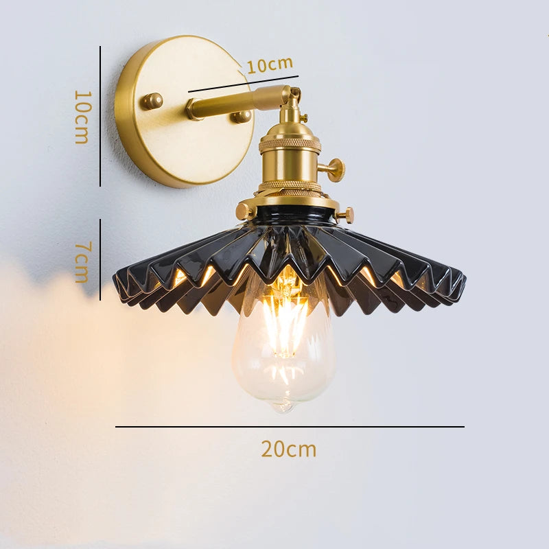 Dimensions Pleated Black Ceramic Wall Sconce, Golden Brass Arm