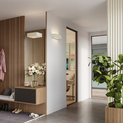 applique murale rectangle en céramique cannelée beige, dans une pièce à vivre