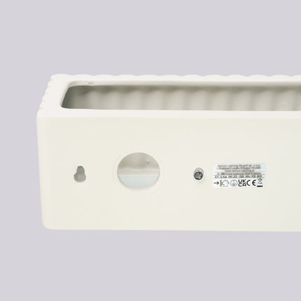 applique murale rectangle en céramique cannelée beige, détail de la fixation
