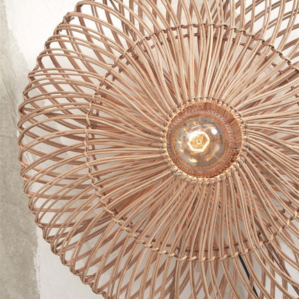 Front view of the Zanzibar natural braided rattan wall light on, sunflower shape