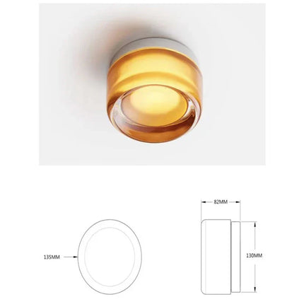 Applique ronde allumée diffusant une lumière ambrée chaude, avec schéma de cotes en centimètres
