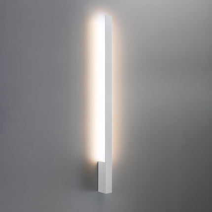 Applique Slim Design blanc allumée, halo blanc chaud diffusé vers le haut et le bas du mur