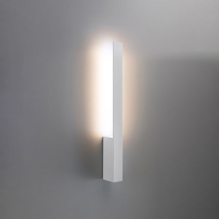 Applique Slim Design blanc allumée, halo blanc chaud diffusé vers le haut et le bas du mur